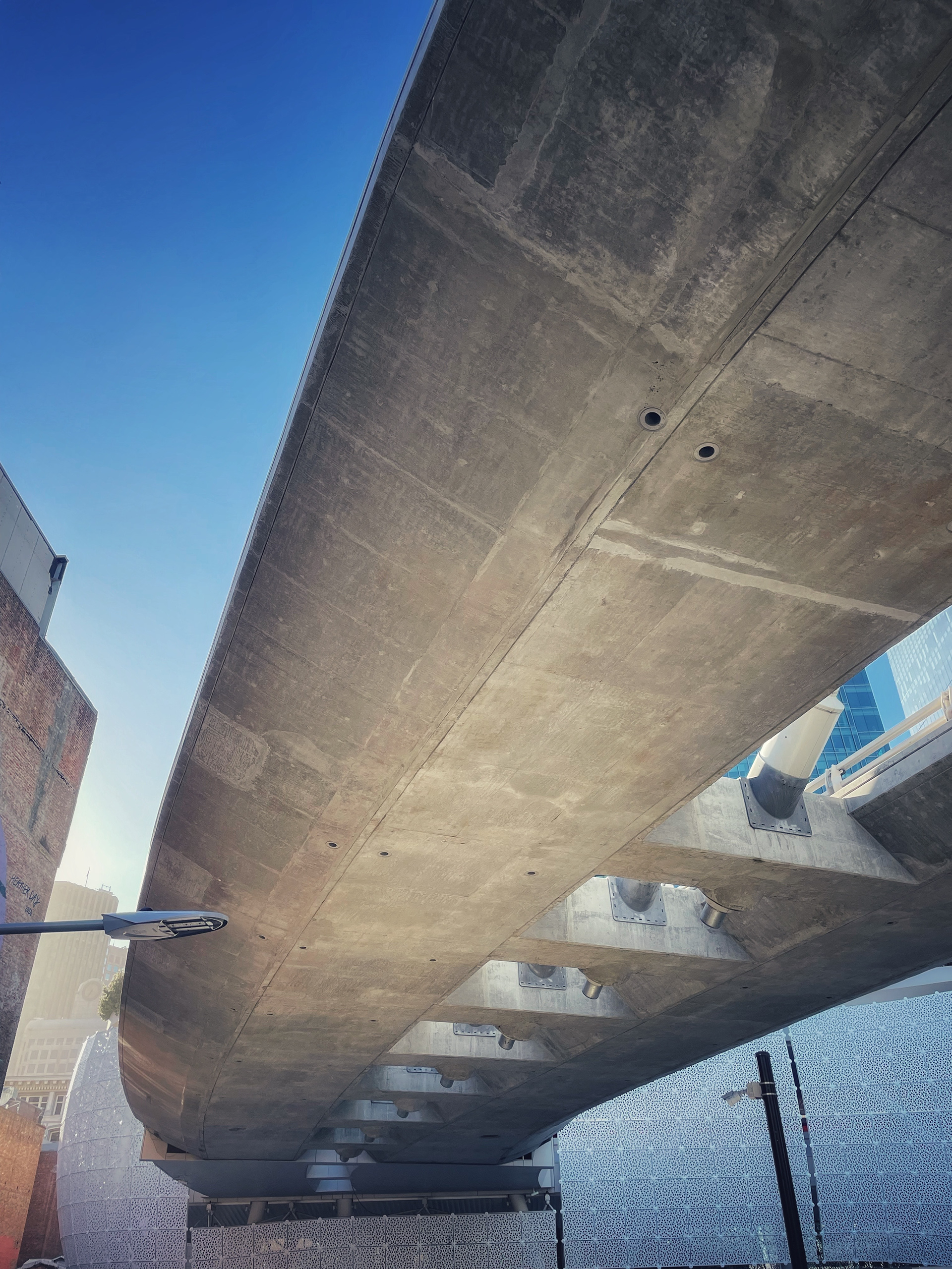 Concrete pedestrian bridge viewed from below